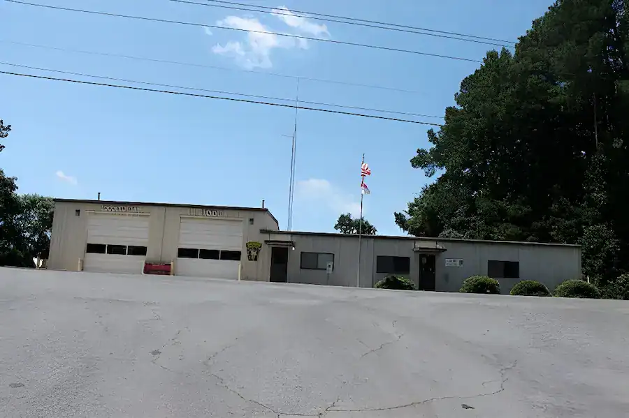 Bahama Fire & Rescue – Station 2 Front view of Station 2 at Bahama Fire & Rescue with two garage bays and a flat roof.