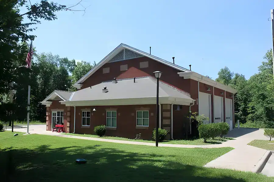 Bahama Fire & Rescue – Station 3 Side view of Station 3 at Bahama Fire & Rescue with red brick exterior and garage bays.